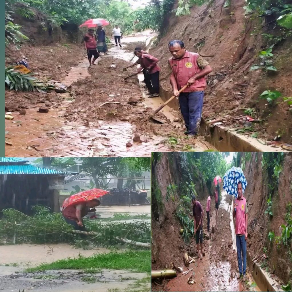 বান্দরবানের লামায় পাহাড় ধ্বসে ভেঙে পড়া মাটি ও গাছ অপসারণ করে রাস্তা সচল করলো হিল ভিডিপি সদস্যরা।